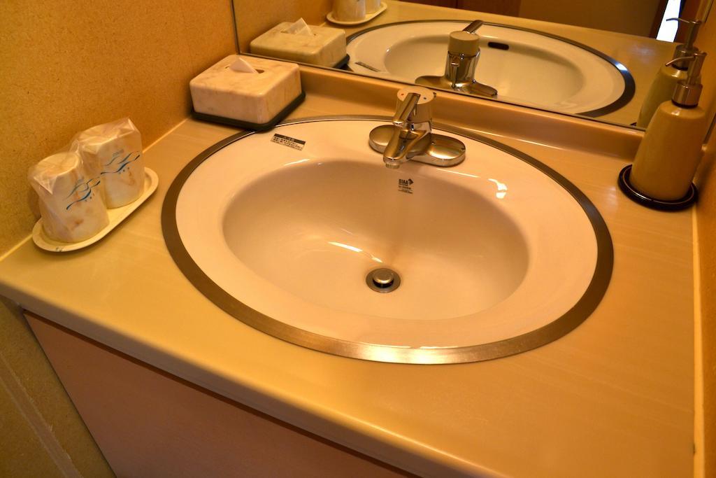 Akita Onsen Plaza Hotel Стая снимка